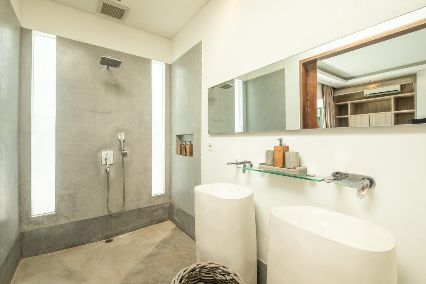 Villa Niko Dua — ensuite bathroom with rain shower and freestanding bath