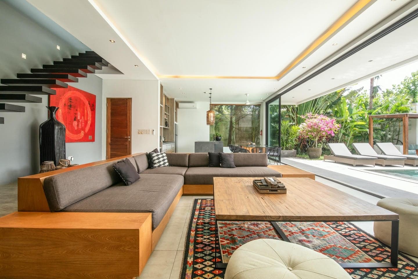 Villa Niko Dua — open living room opening onto the pool terrace