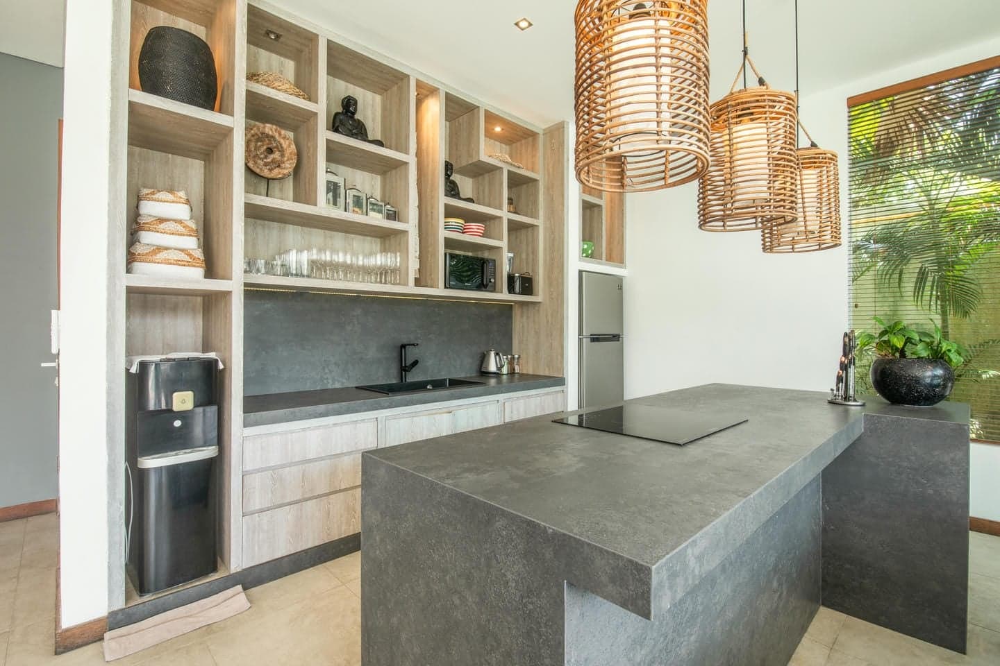 Villa Niko Dua — open kitchen with concrete island